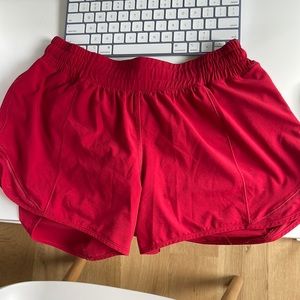 Low rise 4” lululemon shorts. Barely worn, dark red color